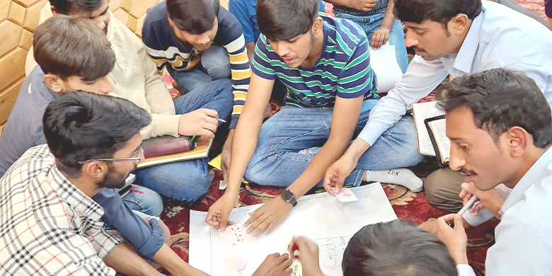 Students participating in a project workshop to enhance their skills.